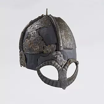 The Gjermundbu helmet. The helmet was deliberately destroyed in connection with the funeral – it was pierced with the spears that lay in the grave, one stab from each.
