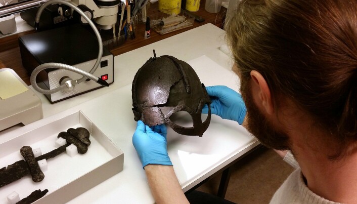 Vegard Vike doing conservation work on the Gjermundbu helmet in 2018. Vegard Vike doing conservation work on the Gjermundbu helmet in 2018.