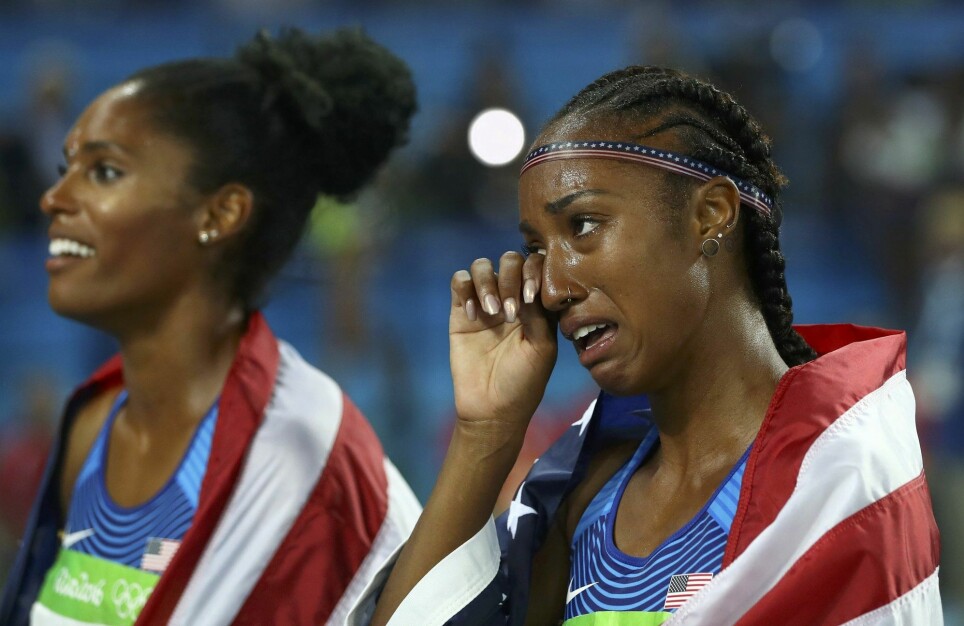 Brianna Rollins (USA) tears up as she celebrates winning the gold medal in the Women 100 meter Hurdles at the 2016 Rio Olympics, with bronze medallist Kristi Castlin.