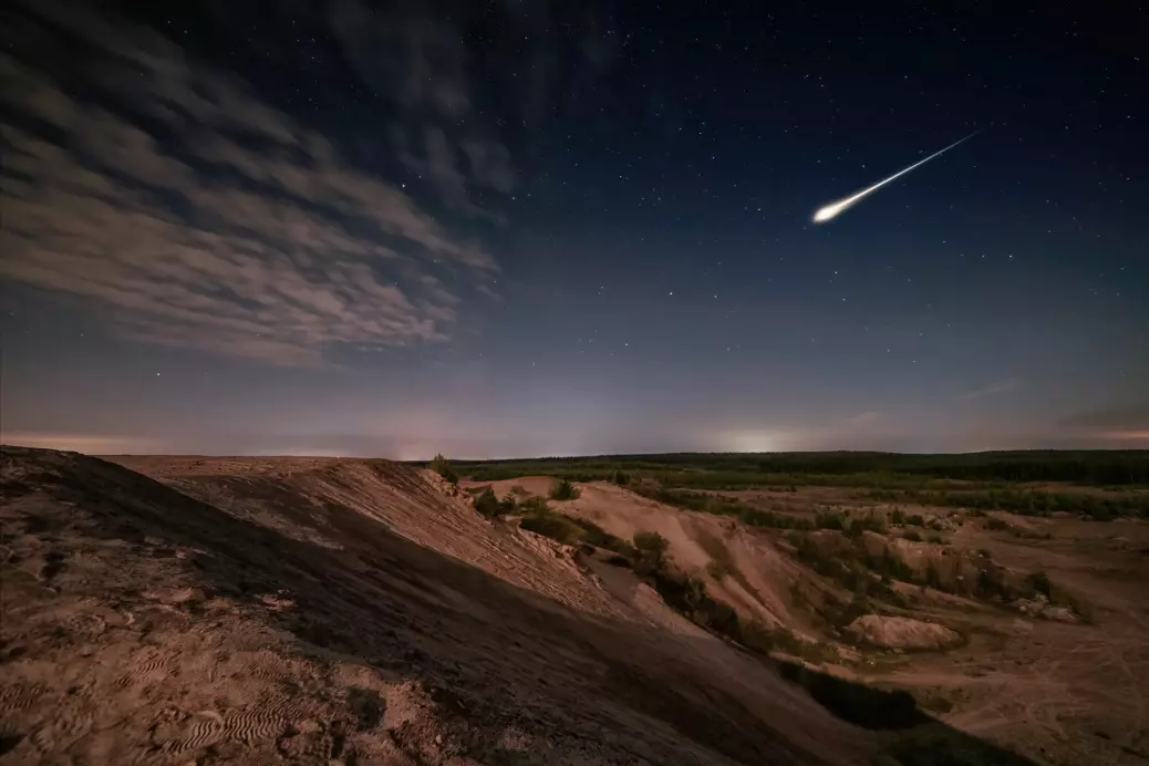 How often do asteroids and comets hit the Earth?