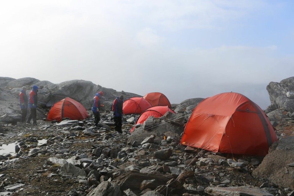 Good camping spots that protect against the wind were hard to find, but the team managed to squeeze in the individual tents and the common mess tent between rocks and puddles.