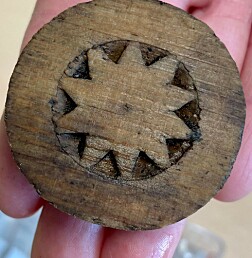 Gaming-pieces and a gaming board found in the Medieval Park in Oslo