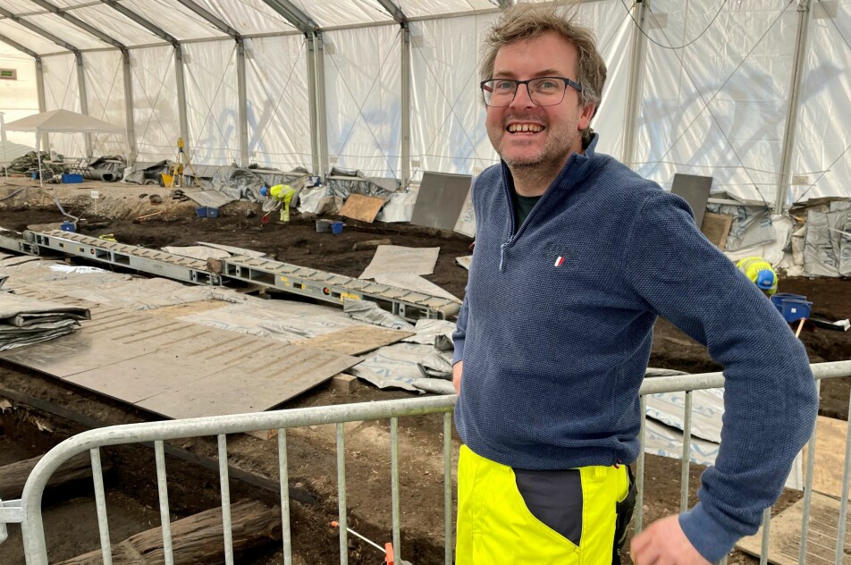 Archaeologist Mark Oldham standing in what would have been the centre of Oslo during the Middle Ages.