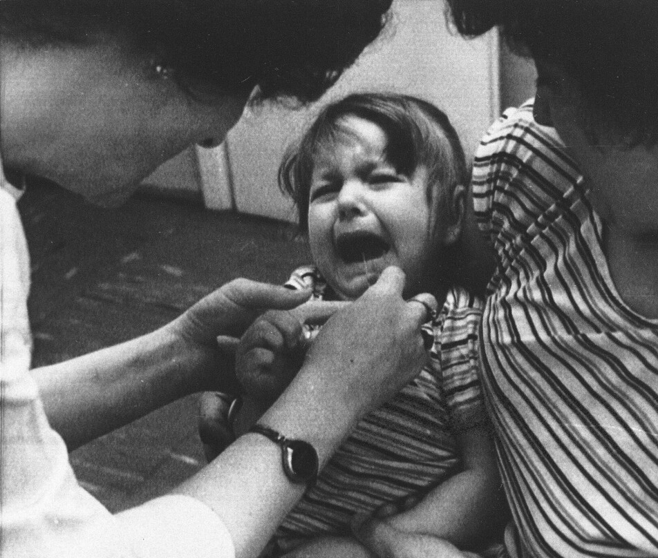 This girl is being given iodine at a children's clinic in Warsaw after the Chernobyl accident in 1986. Children in the vicinity of the accident who received iodine had a lower risk of thyroid cancer.