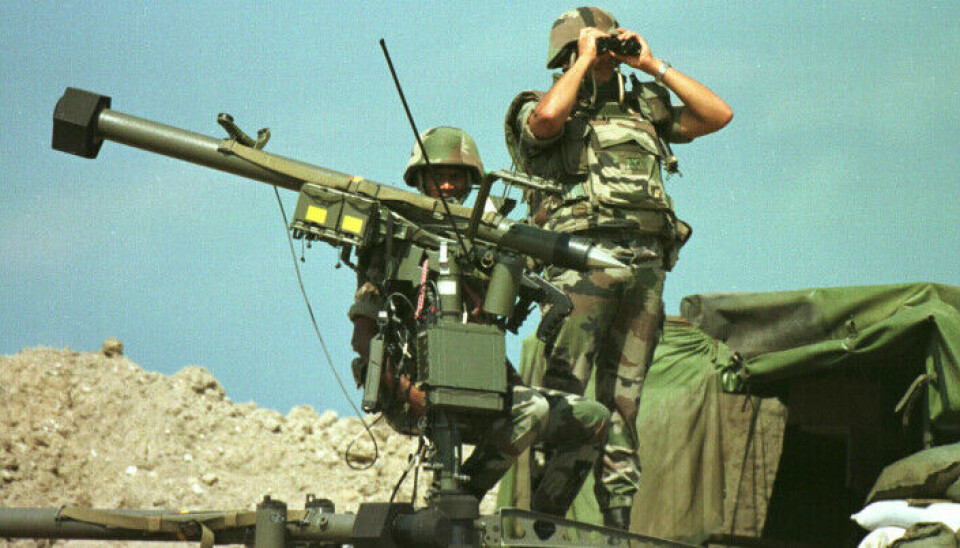 French soldiers on guard with a Mistral system in Macedonia in 1999.