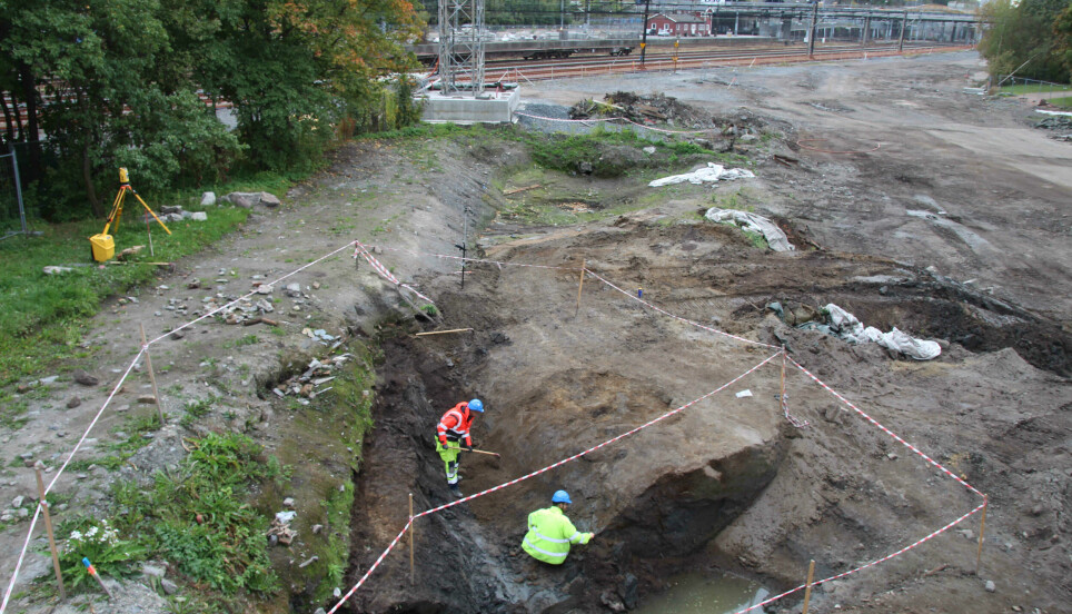 Archaeologists at work, uncovering the old moat which protected the royal manor in medieval Oslo.