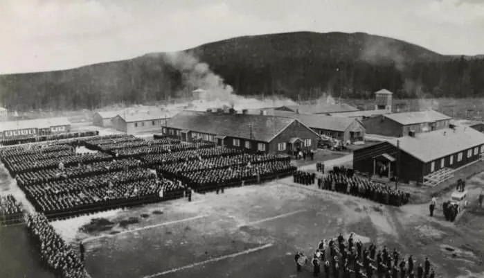 Grini was the largest prison camp in Norway in World War II. Between June 1941 and May 1945, almost 20 000 prisoners were placed here. This photo was taken on Liberation Day 1945.