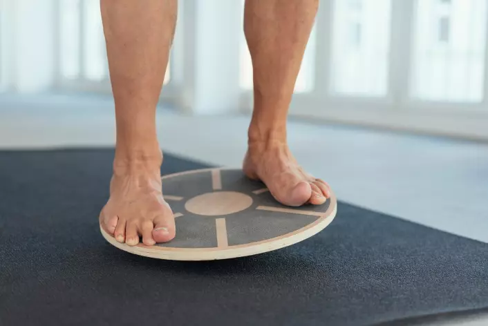 Adding a balance board to your workout routine can be an effective way to improve your balance.