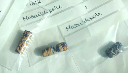 More mosaic beads from the necklace. Beads can often be dated precisely and traced to where they were made.
