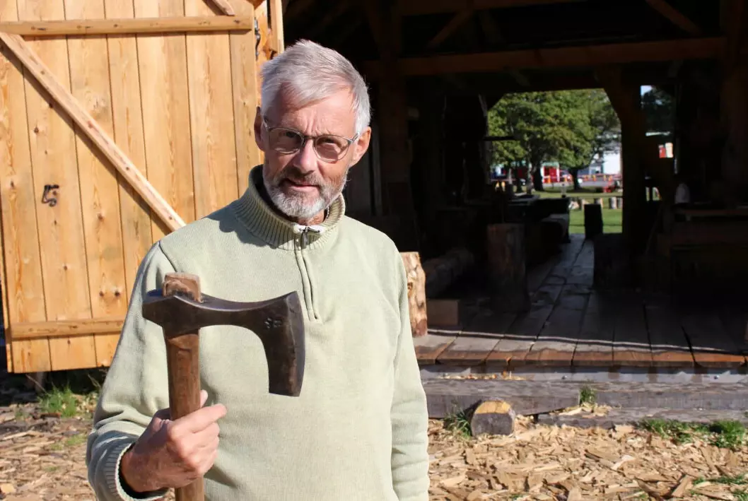 Svein Solberg shows off his good friend, the long bearded axe. It is used for rough chopping, before planing.