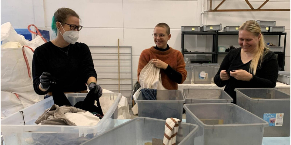 SIFO researchers Lisbeth Løvbak Berg, Anna Schytte Sigaard and Kirsi Laitala are here sifting through the textile waste in a recovery station.