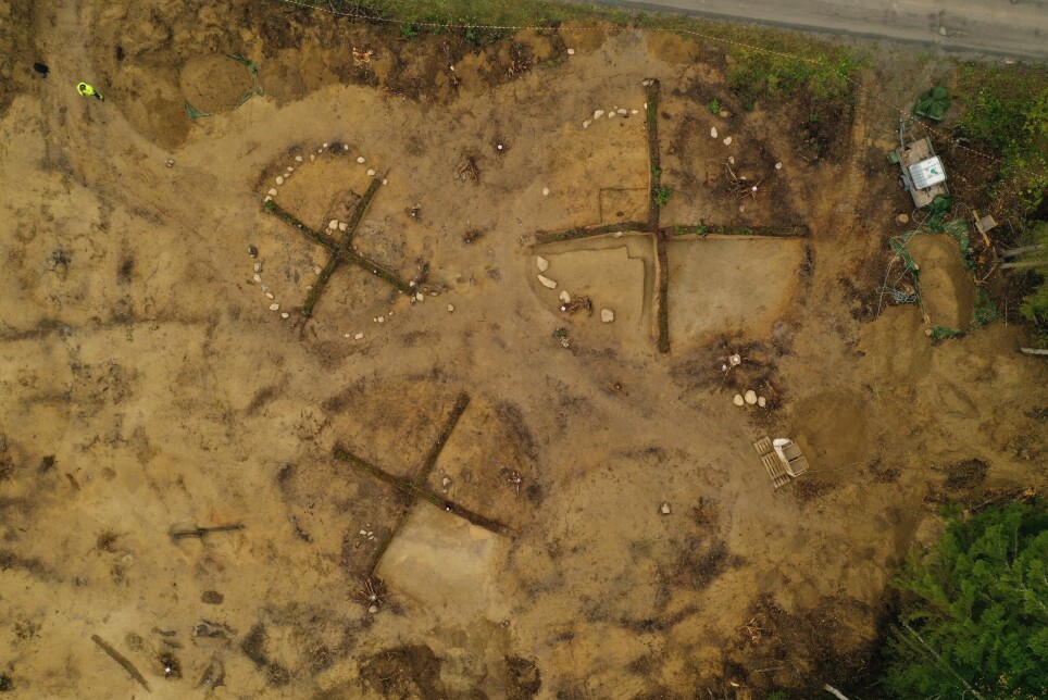 Drone image showing the burial mound excavation. A trailer at the top right of the picture gives a sense of the size of the mounds.