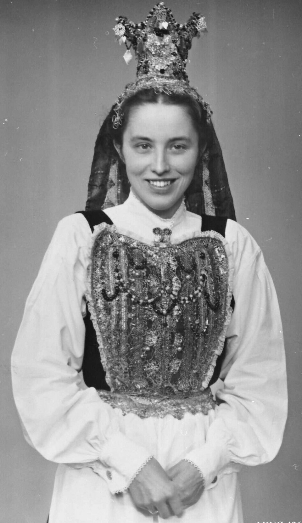 Girl from Alvdal adorned as a bride with a bridal crown in 1930.
