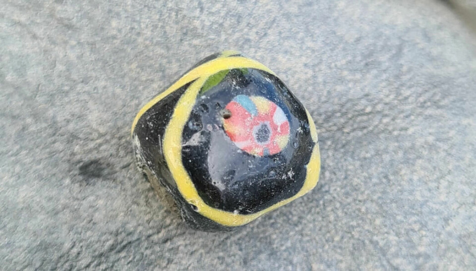 One of the beads that was found in the cooking pits. Was it lost while the owner was having a merry time swinging around?