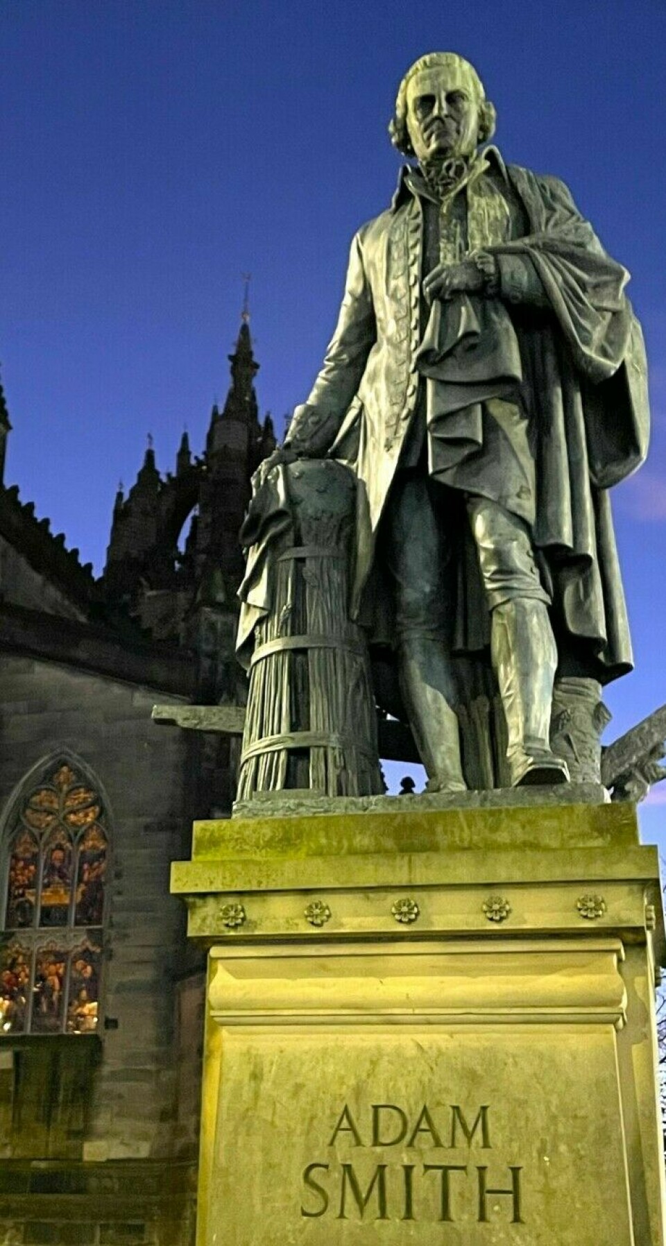 This statue of Adam Smith is in Edinburgh, Scotland.