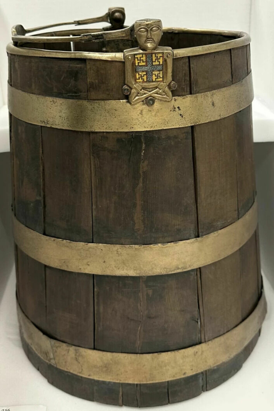 The bucket is crafted from yew and bronze.