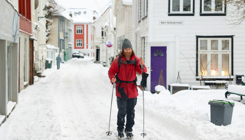 Birk Tjelmeland goes skiing through the streets of Bergen in the western part of Norway on Friday 19 January.