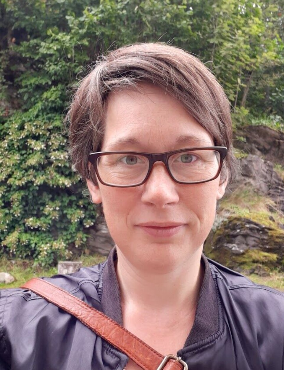 “We thought this was just a lawn,” says Ingeborg Strandberg, the driving force behind the project. Portrettbilde av Ingeborg Strandberg. Hun er utendørs, ikledd sort jakke. Hun har kort, brunt hår og briller.