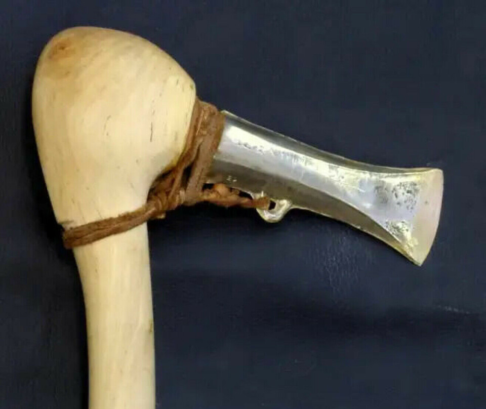 This type of axe was used during the Bronze Age (1700-500 BCE) in the Nordic region. The blade was attached to an angled wooden handle. This allowed a good axe to be created with minimal use of precious metal.