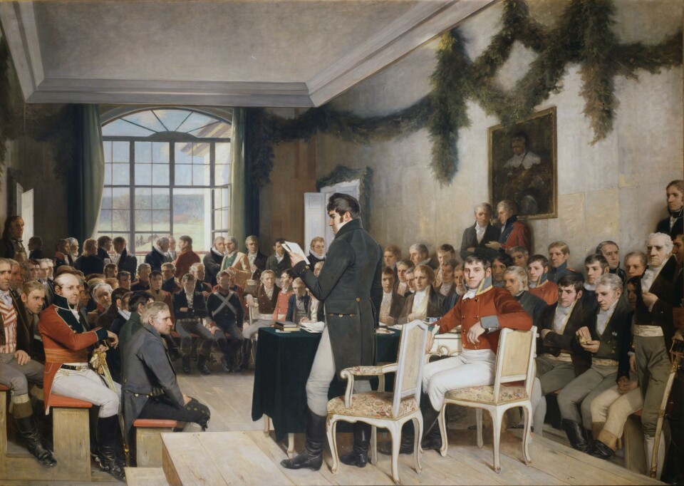 The Eidsvoll delegates, painted 70 years after they met at Eidsvoll. Painter Oscar Wergeland focused on accurately depicting the people, clothing, and interior. The painting, which hangs in the Norwegian parliament, was used as a model for the first restoration of the national hall in 1896.