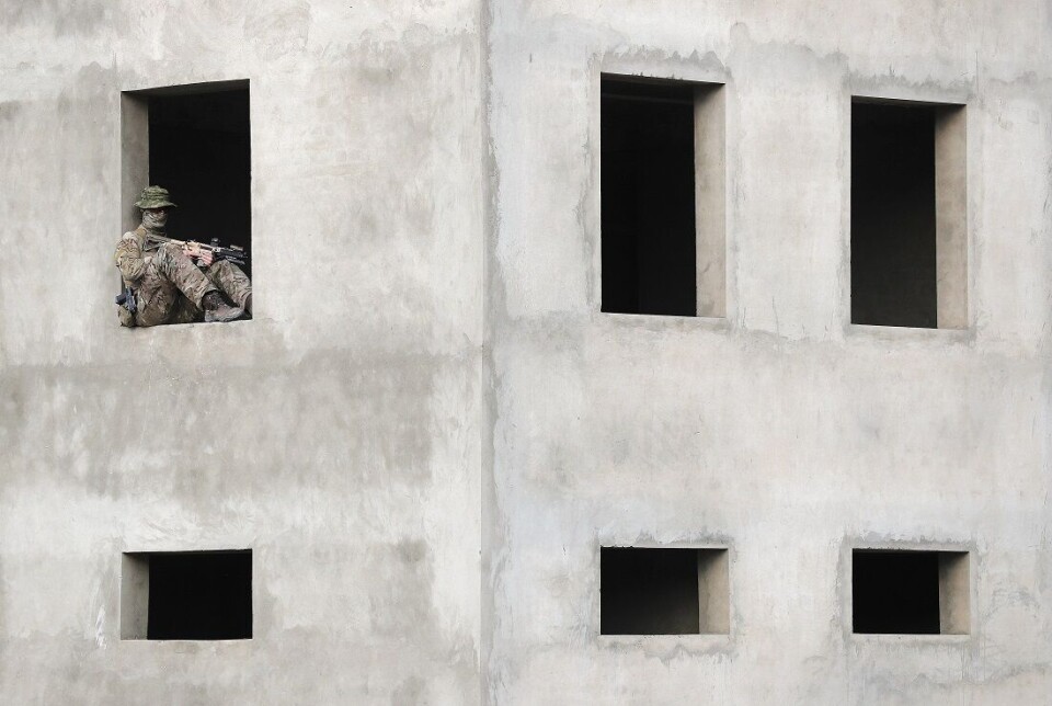 A security guard at NATO headquarters in Kabul.