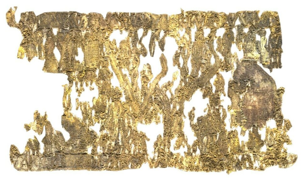 The fragment with the tree and figures. It is poorly preserved.