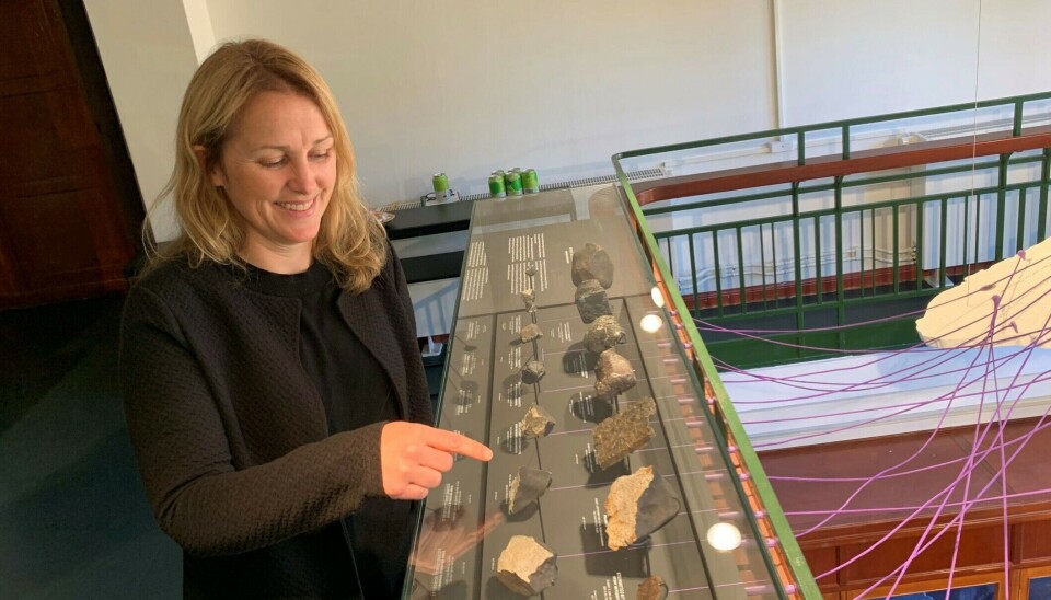 Stine Hårklau points to the stone she found in the mountains. It turned out to be one of only 17 meteorites ever discovered in Norway.
