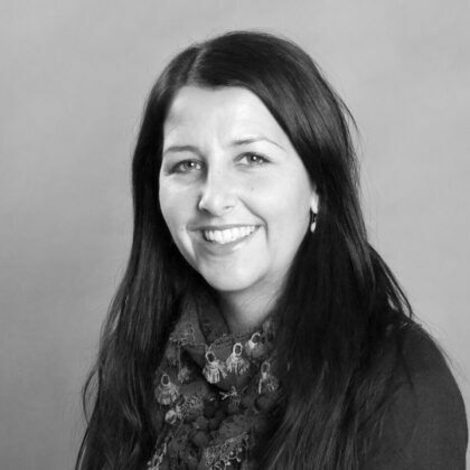 Hanne Ekstrøm Jordahl is an osteoarchaeologist at NIKU. Black and white photo of a woman with long dark hair.