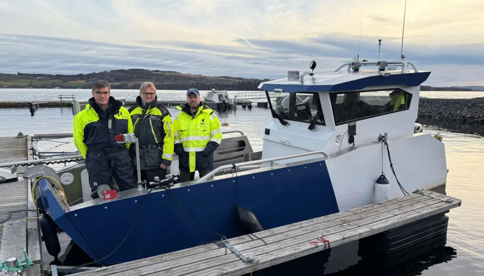 'The technology has worked absolutely excellently this time,' says Ødegård. 'We’ve gathered a wealth of data from the wreck and the dumping field, which will now be processed and analysed.' From left: Asgeir Sørensen, Geir Johnsen, and Øyvind Ødegård, all from NTNU. Three men dressed in yellow standind on a boat.