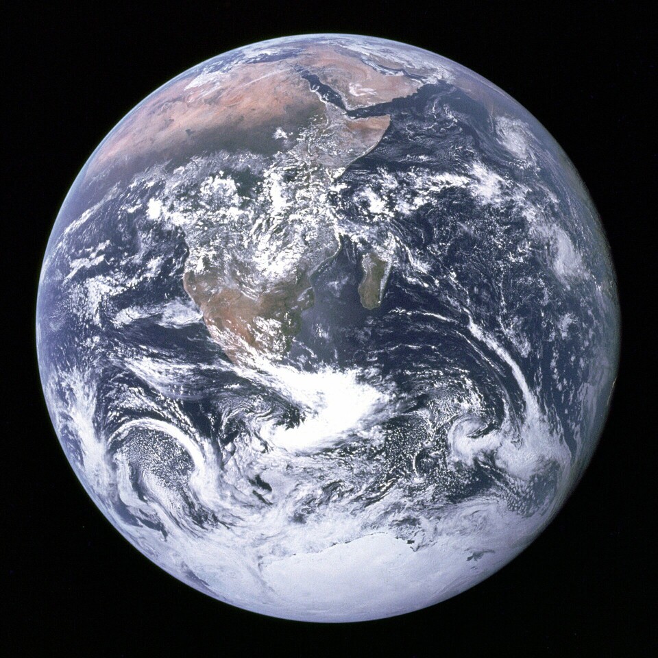 In this Apollo image of Earth from space, the equatorial bulge is invisible. The planet appears almost perfectly round, but the bulge is still there.