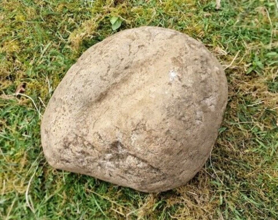 This is the stone in the boat that archaeologists call a vulva stone.