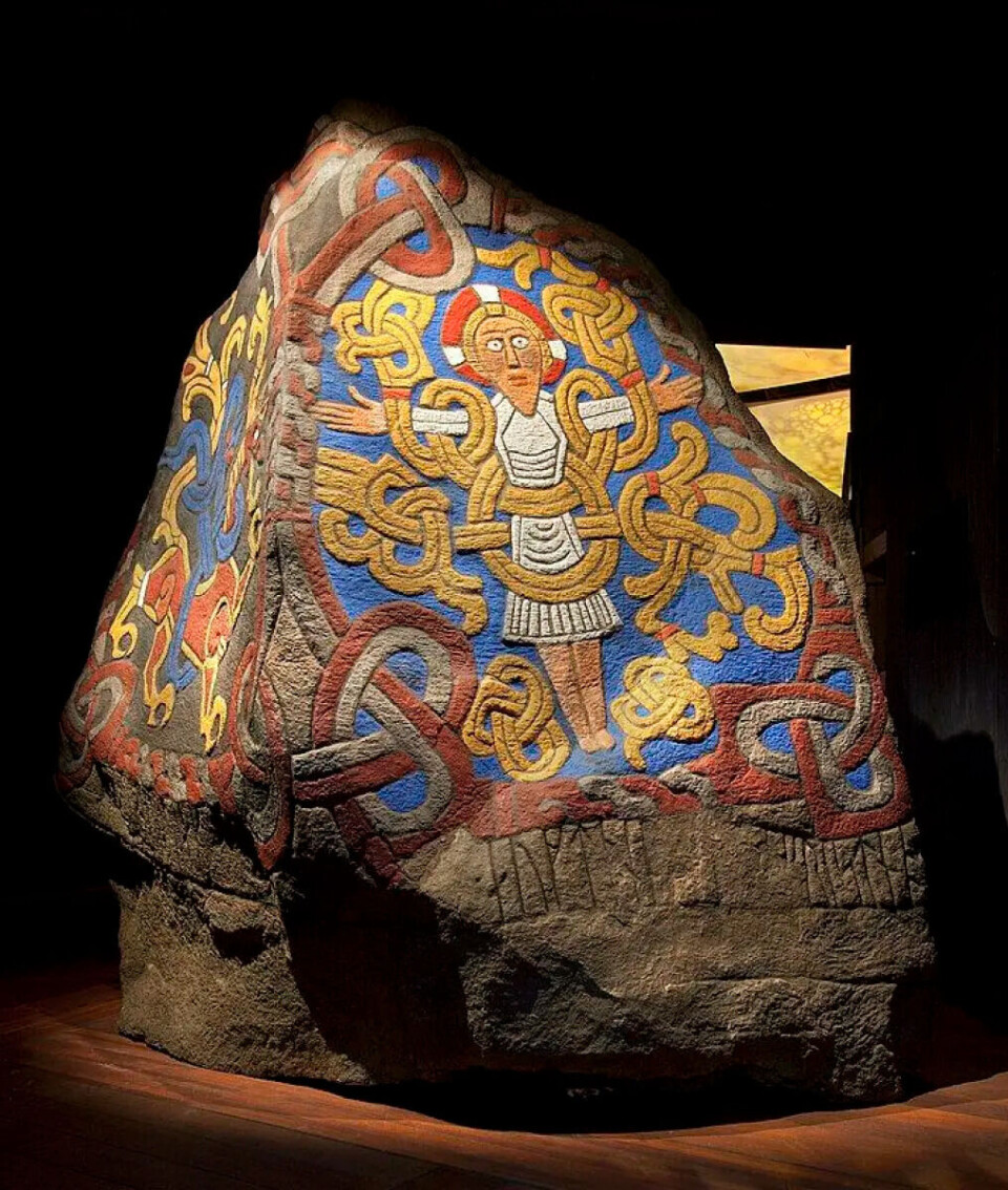 The Christ figure in colour, from the VIKING exhibition at the National Museum in Copenhagen in 2013. Exposure to wind and weather has reduced it to just the pattern today, but when originally made, they were painted in vibrant colours,
