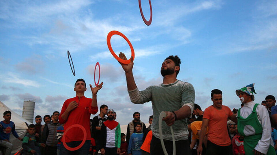 Historian Abou-Hodeib is particularly focused on the non-violent Palestinian resistance that has taken place between major catastrophes. Here, young men participate in the Great March of Return in 2018.