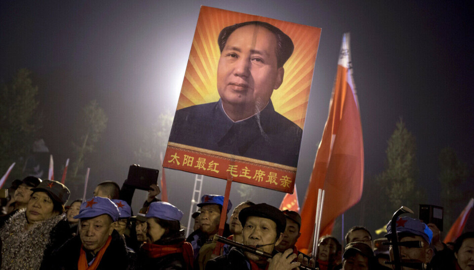China has a complicated relationship with Mao. This photo shows a group of Mao enthusiasts.