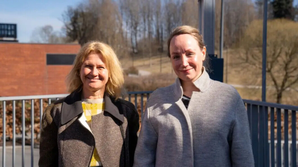 Researchers Gunn Enli and Sigrun Marie Moss say that many people feel the need to both shield themselves from the global situation while still staying informed and engaged. Close up of two women in coats smiling towards the camera.