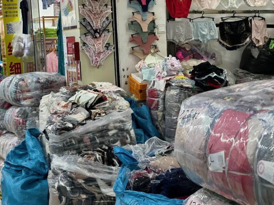 Clothing that factories have left over after production for Shein is sold in the market in Guangzhou.