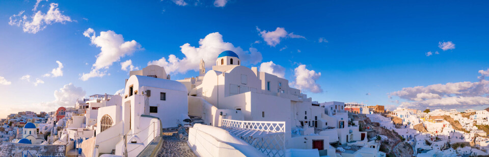 Many of the houses in Greece are painted white. This helps them stay cooler.