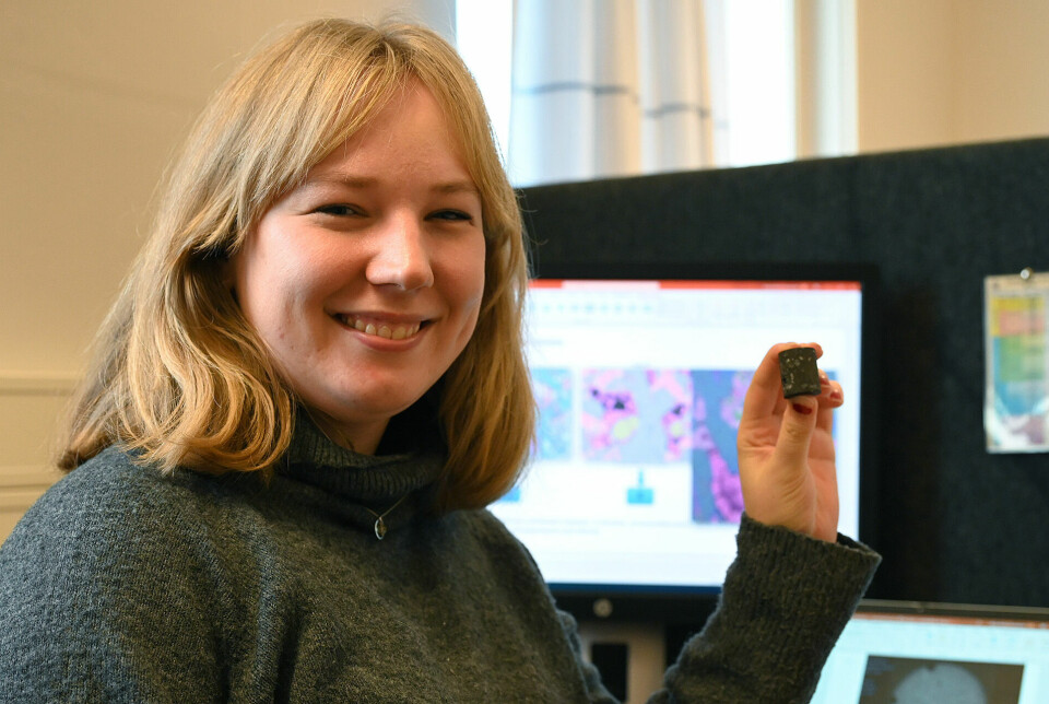 Marija Rosenkvist with a sample of lava rock from the seabed.