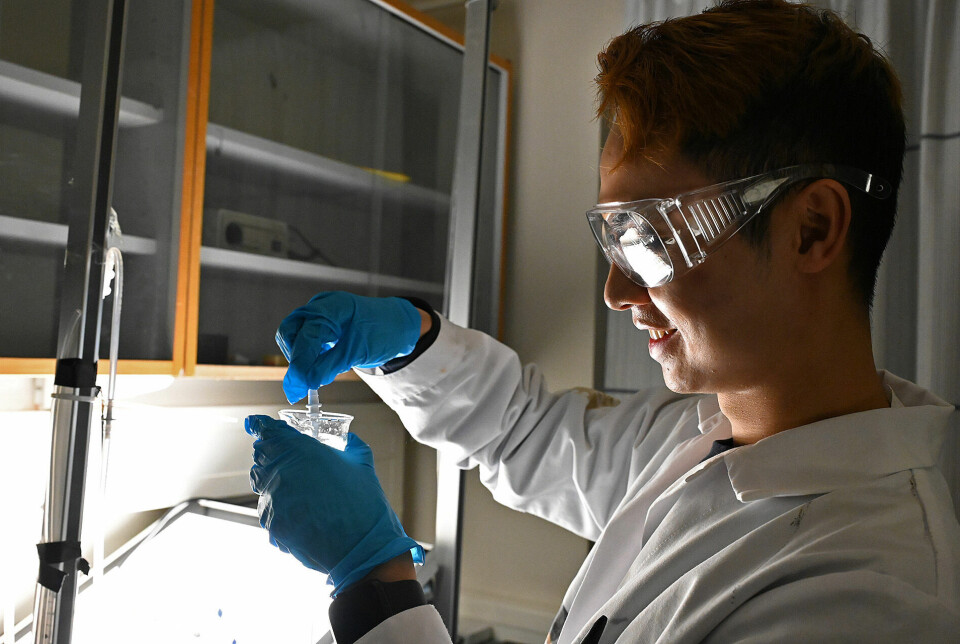 CO2 is invisible, so Yao Xu uses a glass of water to check that there is gas in the system.