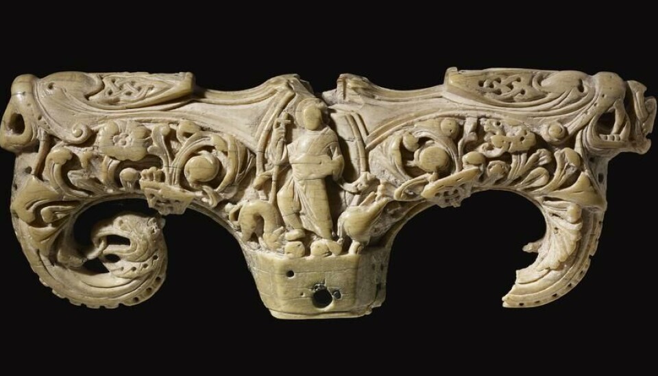 The bishop’s staff, carved in ivory, features rich ornamentation.