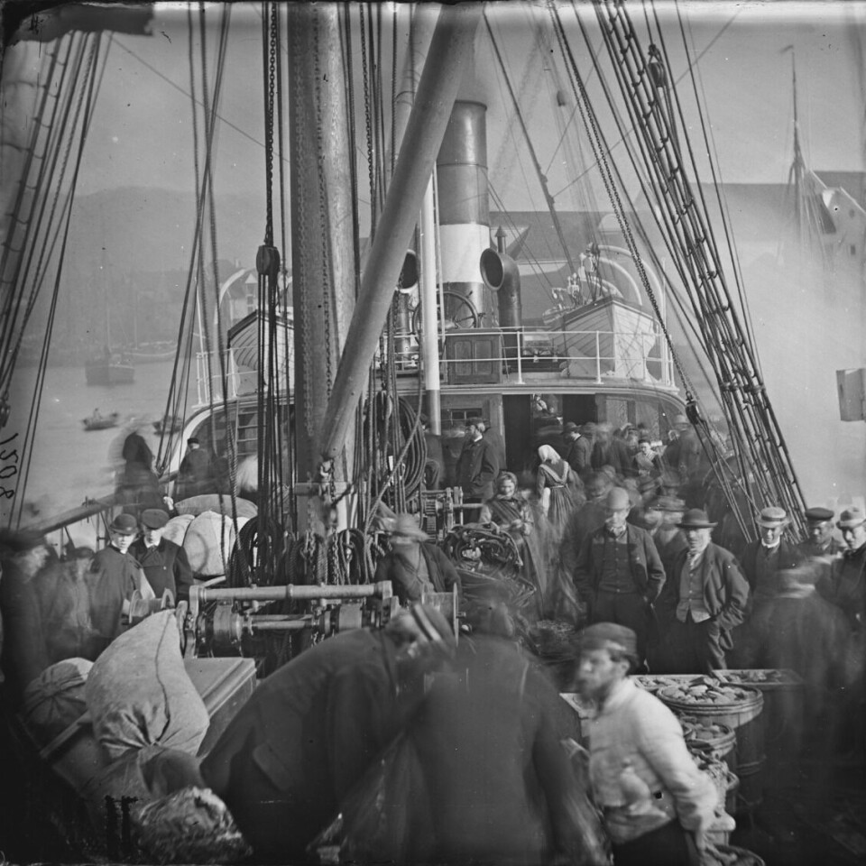 An emigrant ship being prepared for departure from Bergen in the early 1870s.