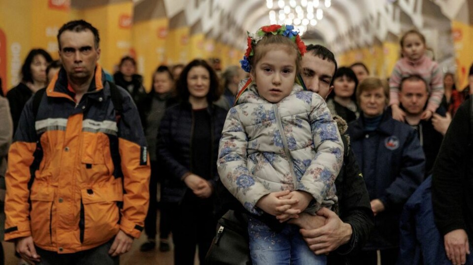 The sound of air raid sirens has become part of daily life in Ukraine. Here, people gather at an underground station in Kharkiv that serves as a bomb shelter, March 2022.