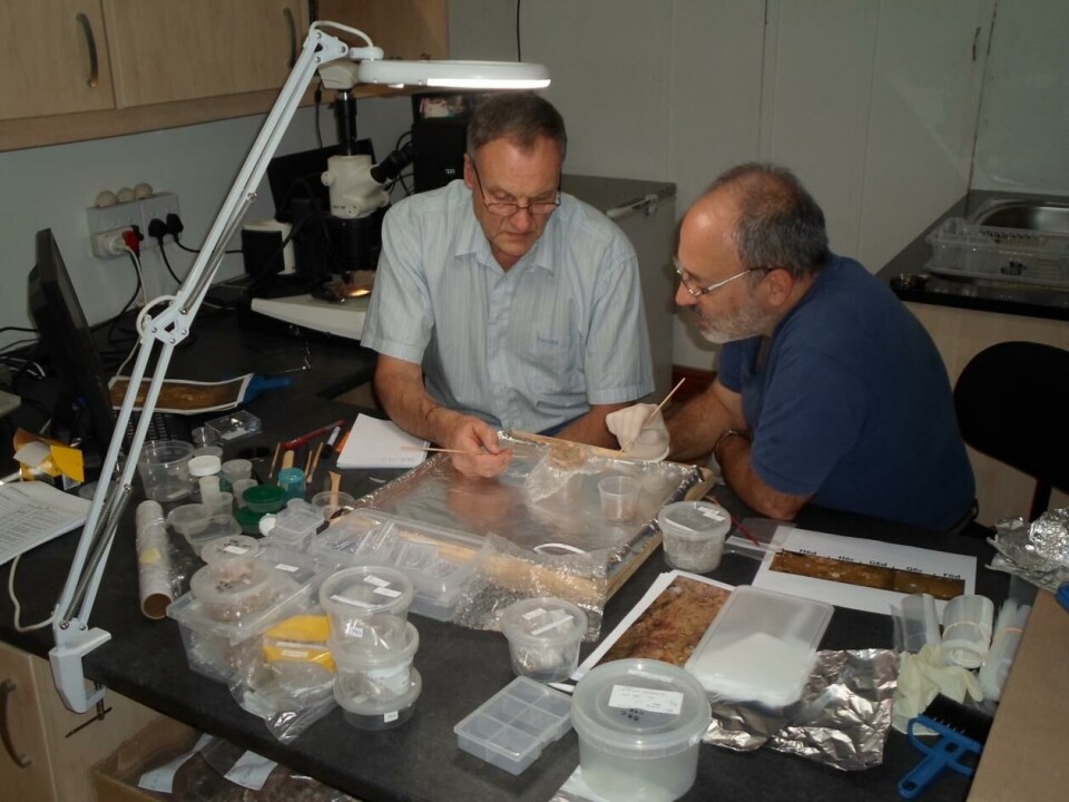 From left: Christopher Henshilwood and Francesco d’Errico working in the SapienCE lab in Cape Town, South Africa.