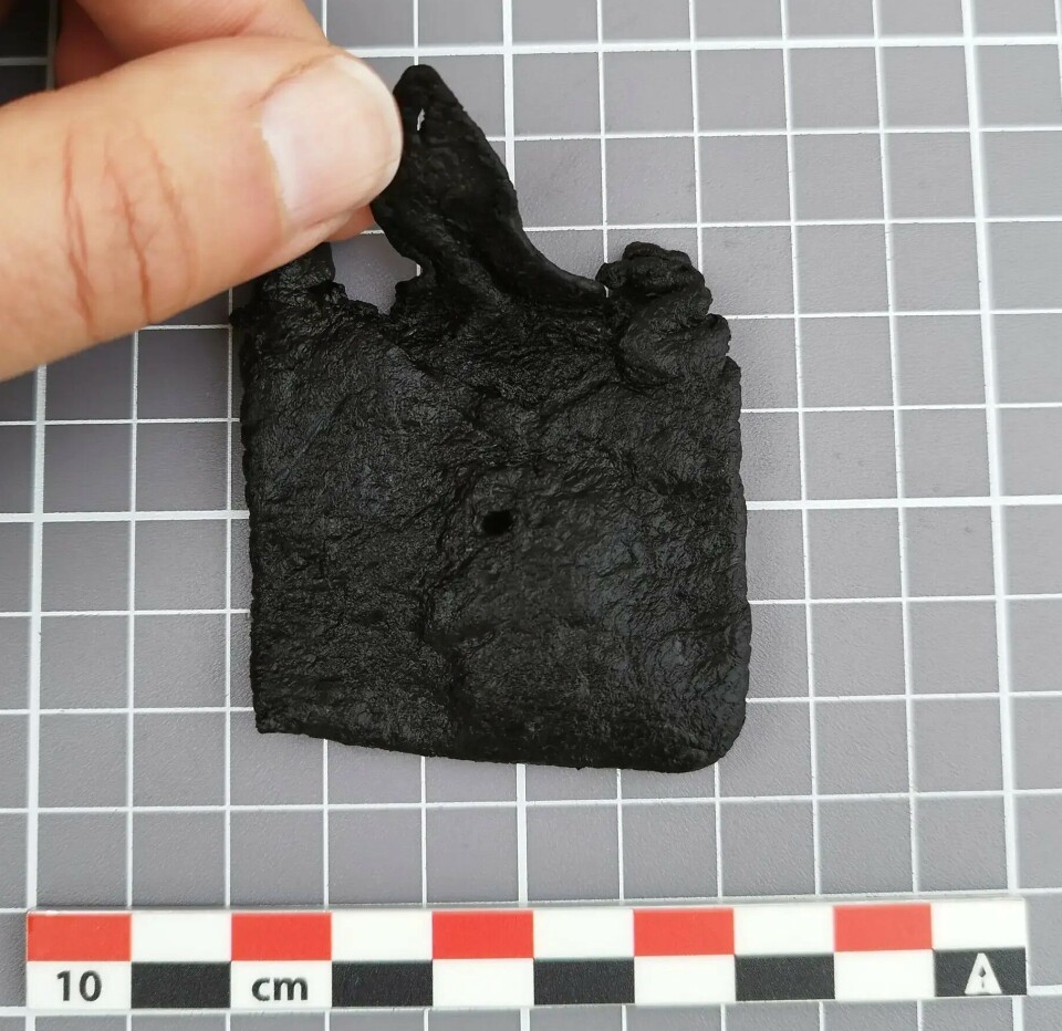 Perhaps this tiny bag was protection for an amulet or a cross? It could also have been a child's toy. The mini bag is 5x5 centimetres and made from a single piece of leather that is folded and stitched along the edges.