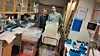 Two researchers in a lab with lots of equipment.