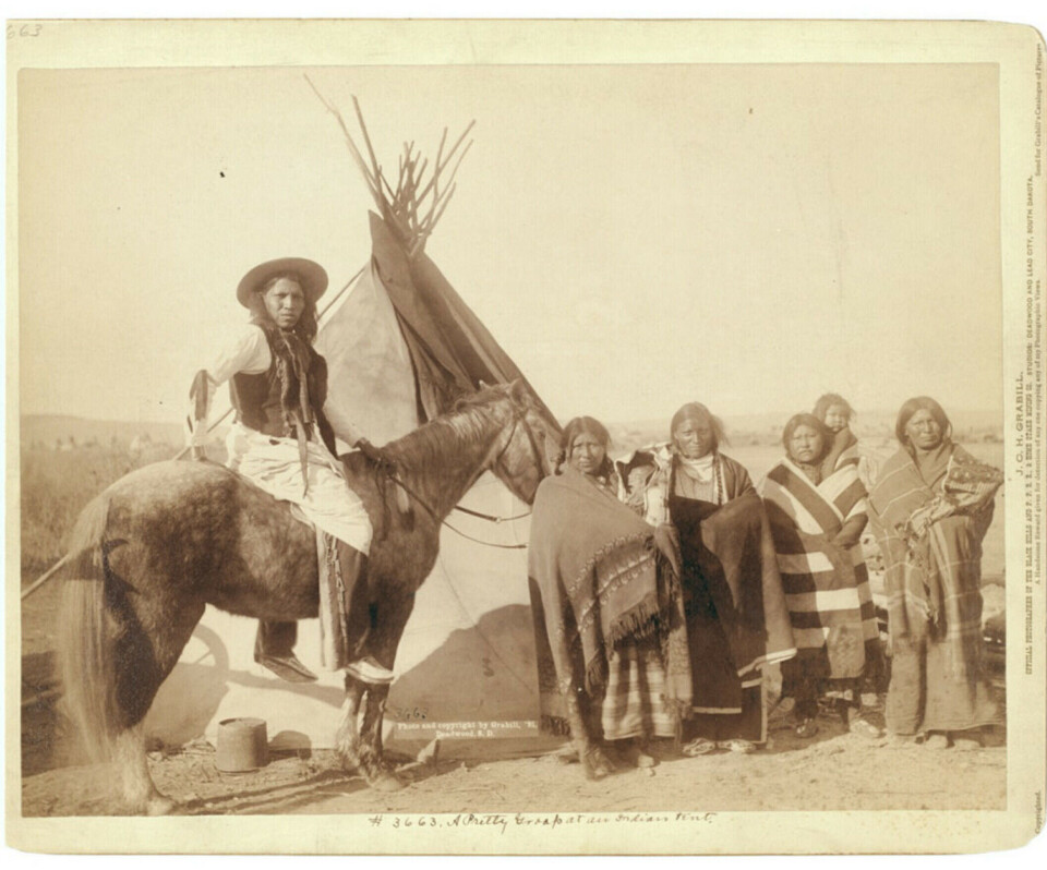 People from the Lakota tribe on the Pine Ridge Reservation in 1891. Greedy agents from the federal government took money and supplies that should have gone to the Indigenous people.