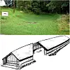 Grassy hollow of a boathouse site with a forest in the background above a sketch reconstruction of the long wooden building.