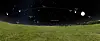 Panoramic night sky simulation with labelled stars and planets above a grassy field.