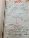Close-up of a German-language document stamped 'HEMMELIG' and 'SECRET' with handwritten notes and official marks.