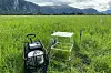 Gas chamber system measuring emissions in a green peatland field at Farstad.
